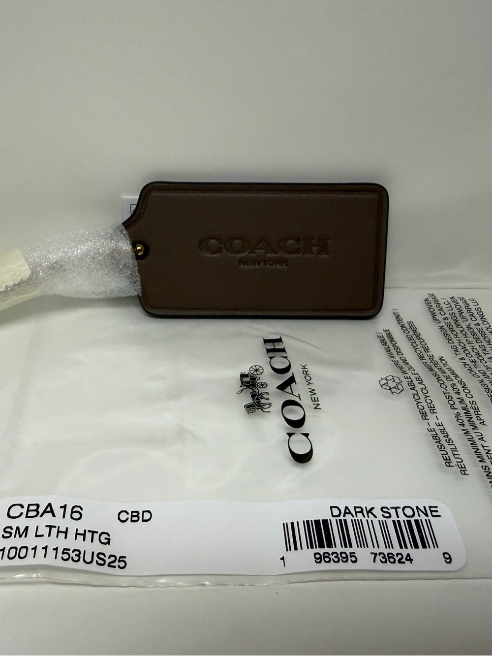 COACH Leather Hangtag in Dark Stone